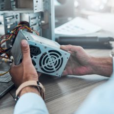 Hardware, repair and computer with hands of man for cpu system, maintenance or it engineering. Electronic, motherboard and circuit with technician fixing equipment for technology, microchip or expert.
