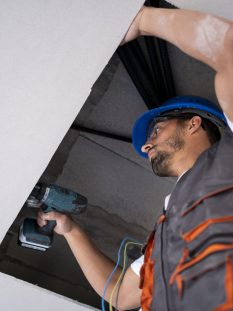 medium-shot-man-working-with-drill
